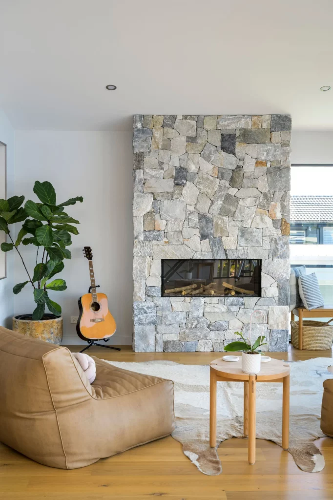 feature fireplace with stone cladded wall
